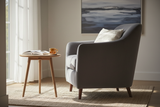 Load image into Gallery viewer, Verve premium upholstered lounge chair side profile view in Scandinavian living room