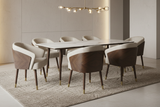 Load image into Gallery viewer, Dining Chair Cadiz with gold-tipped legs around a marble dining table