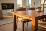 Load image into Gallery viewer, Cadenza solid wood dining table close-up with rich wood grain texture